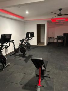 a gym with several exercise bikes in a room at AG Dusty Luxe Suite #3 in San Miguel de Allende