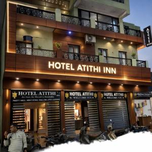 a hotel atithin inn is pictured at night at hotel atithi palace in Jabalpur
