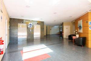 a lobby of a hospital with a waiting room at Vista Premium Laguna Centro Concepción in Concepción +58 photos
