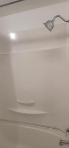 a close up of a white ceiling with a metal latch at Neepawa Motel in Neepawa
