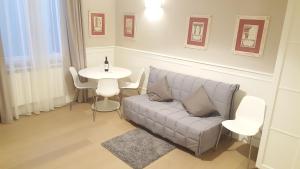 A seating area at Scala Suite