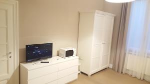 A television and/or entertainment centre at Scala Suite