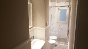 A bathroom at Scala Suite