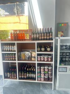 a refrigerator filled with lots of different types of drinks at THUẬN VƯƠNG Homestay in Vĩnh Hy +113 photos