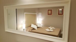 A bed or beds in a room at Scala Suite