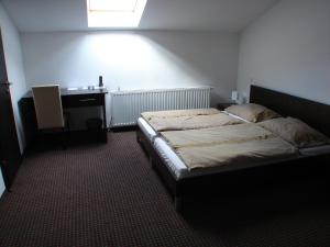 Postel nebo postele na pokoji v ubytování Rooms Levicki