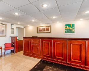 a waiting room at a hospital with avertisement for at Quality Inn Dyersburg I-155 in Dyersburg