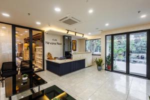 a lobby of a store with a counter at Nirvana Nest - Corporate Stay, Gomti Nagar, Lucknow in Lucknow