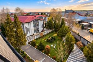 an aerial view of a yard with trees and houses at Gagarin Luxury Apartment in Samarkand