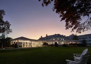 a large building with a lawn in front of it at Seaview Hotel in Galloway