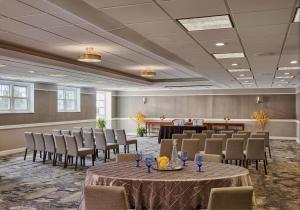 a conference room with tables and chairs in a room at Seaview Hotel in Galloway +49 photos