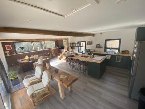 an aerial view of a living room and kitchen at La Vieille Scierie in Basville