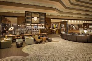 a lobby of a hotel with couches and chairs at Hyatt Regency San Francisco in San Francisco