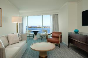 a living room with a couch and a table at Grand Hyatt Tampa Bay in Tampa