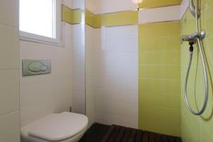 a bathroom with a toilet and a shower at Villas del Empereur in Hendaye +19 photos