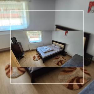 Un pat sau paturi într-o cameră la Master apartman