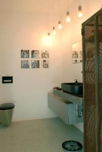a bathroom with a sink and a toilet at Villa Kastro in Parikia +41 photos