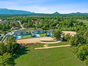 an aerial view of a house with a yard at House Degenia in Lovinac