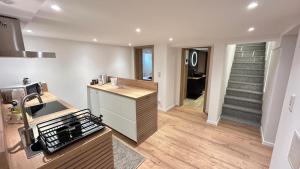a kitchen with a sink and a counter top at Ferienwohnung Nella in Paderborn