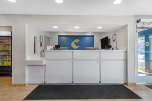 an office with white cabinets and a counter with a crescentrescent at Comfort Inn & Suites Mt Laurel-Philadelphia in Mount Laurel