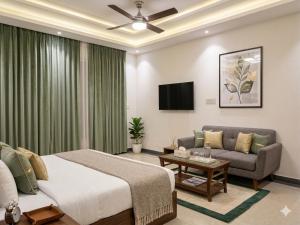 a hotel room with a bed and a couch at Hotel Krone Plaza Near IGI Airport Delhi in Champawat