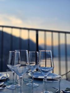 a group of wine glasses sitting on a table at Hotel Credo in Kotor
