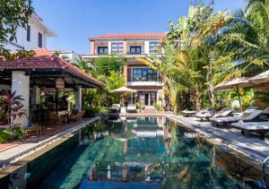 an image of a swimming pool at a resort at Angkor Eden Boutique Hotel in Siem Reap