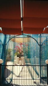a room with a large window with plants in it at Nbta House in Tangier