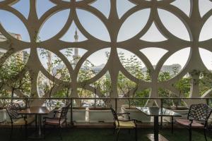 a view from the roof of a restaurant with a patterned ceiling at Violet Al Azizia Hotel MASJID Al Qatari in Mecca