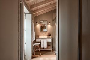 a bathroom with a sink and a mirror at Casa Conde in Furelos +122 photos