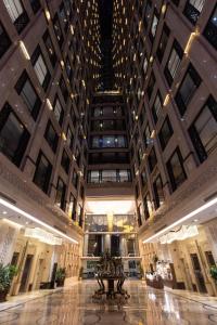 a view of a building with a large ceiling at Violet Al Azizia Hotel MASJID Al Qatari in Mecca