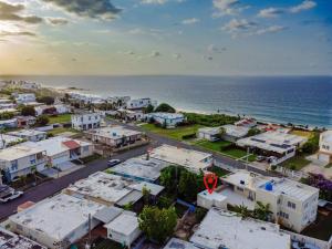 an aerial view of a town next to the ocean at El Apartamento Nuestro in Isabela +11 photos
