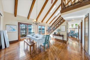 a dining room with a table and chairs at Pine Knob Point - Lakehouse w/ Private Dock in Moneta