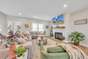a living room with a couch and a fireplace at Lake Twin Cove - New! in Moneta