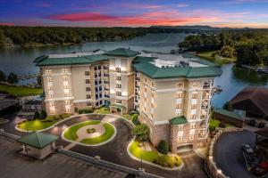 an aerial view of a building on the river at Lake Stardust - Condo with pool ! Pet friendly in Moneta