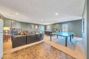 a living room with a table and a couch at Whisper Haven - Private dock & Pet friendly in Moneta +27 photos