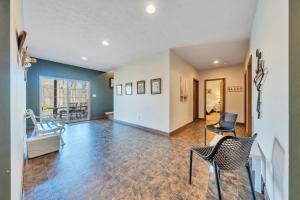 a living room with chairs and a couch at Whisper Haven - Private dock & Pet friendly in Moneta