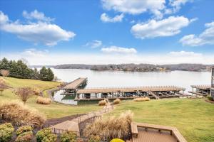 a view of a lake with a dock at Lake Vibes - Pet Friendly Lakefront Condo! in Moneta