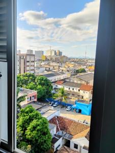 a view from a window of a city at Flat Bonito e Confortável in Campos dos Goytacazes