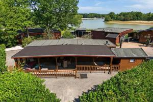 an overhead view of a building with a roof at Ermrest Cottage in Erm