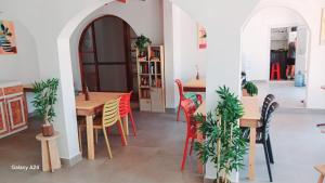 a dining room with a table and chairs at Kavala Hotel Bodrum in Bodrum City