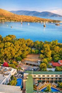 an aerial view of a resort with a body of water at Casa Blue Hotel All Inclusive in Bodrum City