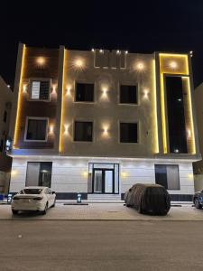 a building with a car parked in front of it at دار مسك الفندقية in Medina
