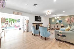 a living room with a couch and a table at Pink Flamingo in Clearwater