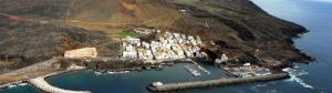 an aerial view of a small harbor on a mountain at Casa Ángela in La Restinga