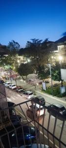 a view of a parking lot with cars parked at SuiteMazzini in Lamezia Terme