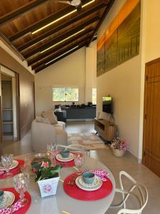 a living room with a table with dishes on it at Loft Toscana in Santa Teresa