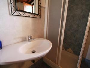 A bathroom at Farmhouse in Asciano with Pool and Countryside