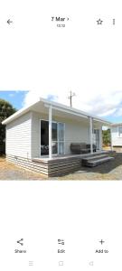 a collage of photos of a house at Raglan park rest and stay cabins - Private studio in Raglan