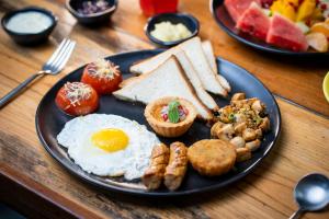 a plate of breakfast foods on a table at GaasBaasCompany, Thamel, Kathmandu in Kathmandu